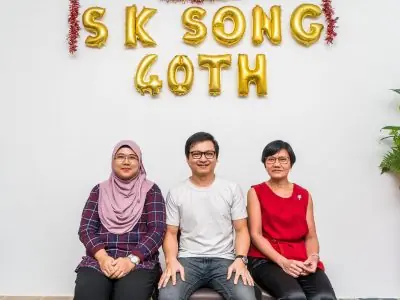 Team celebration with cake after case victory