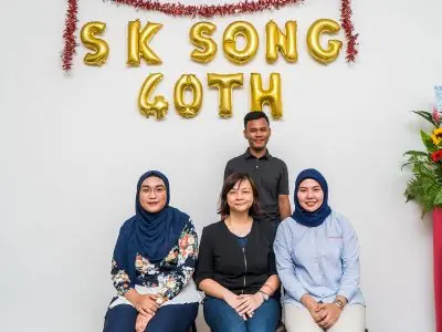 Client and lawyer shaking hands in conference room