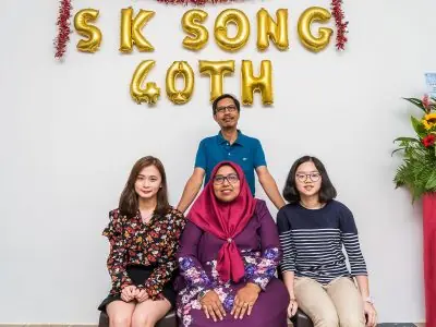 Young associate reviewing case files at workstation